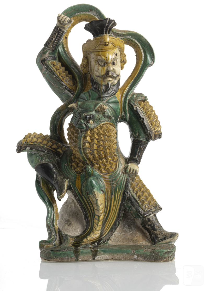 A large 'sancai'-glazed ceramic figure of one of the four heavenly kings
